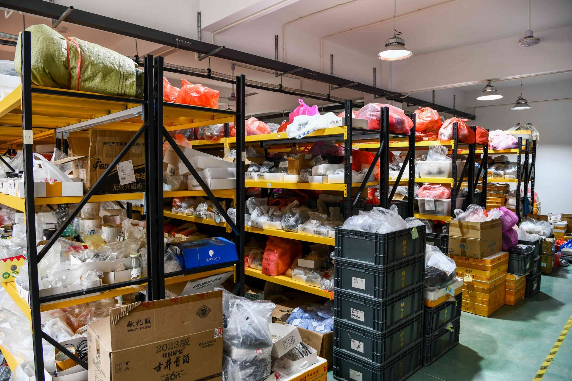 Comprehensive raw materials warehouse with industrial-grade racking system at HAO Eyewear